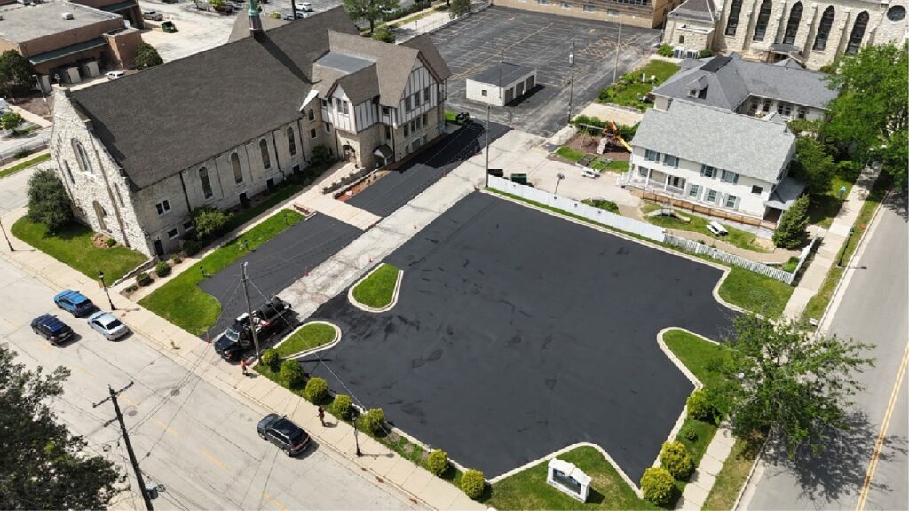 Commercial sealcoating of a church parking lot in Waukesha Wisconsin by Black Earth Pavement